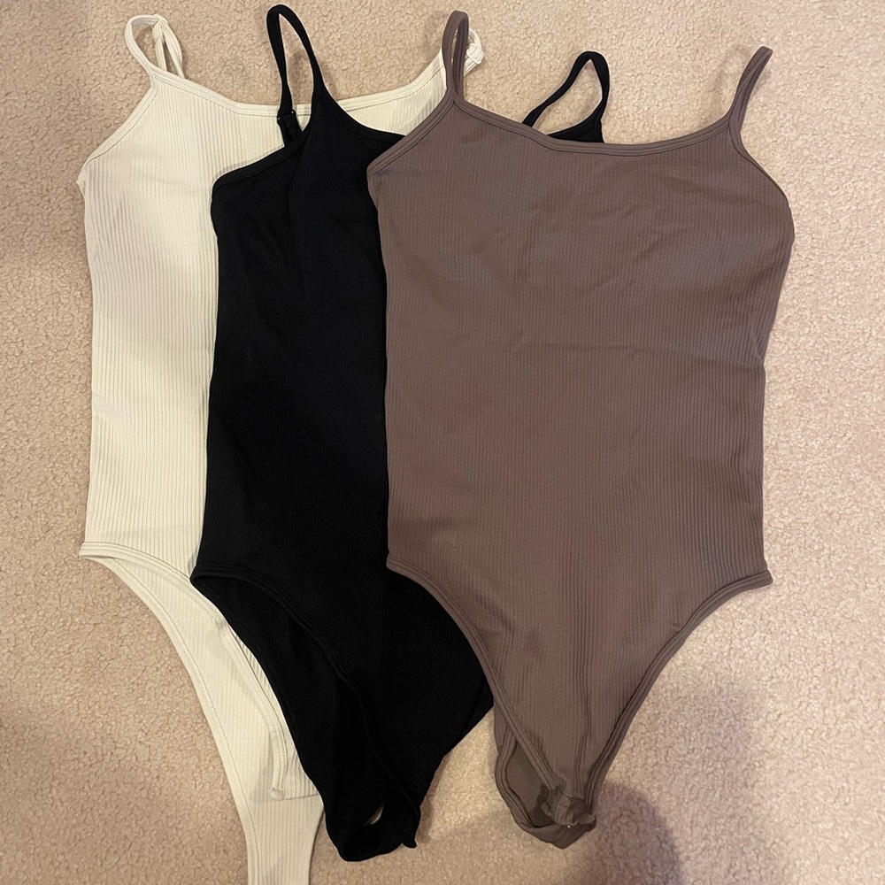 Set of Three Ribbed Bodysuits - White, Black, and Brown